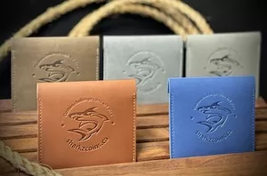 Custom leather or pleather pouches provide a protective presentation package for challenge coins
