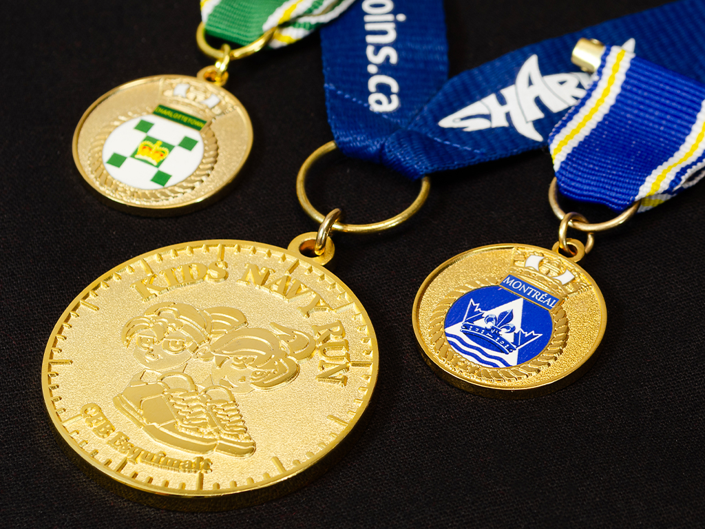 Custom gold kids medals for sports and military in various sizes.
