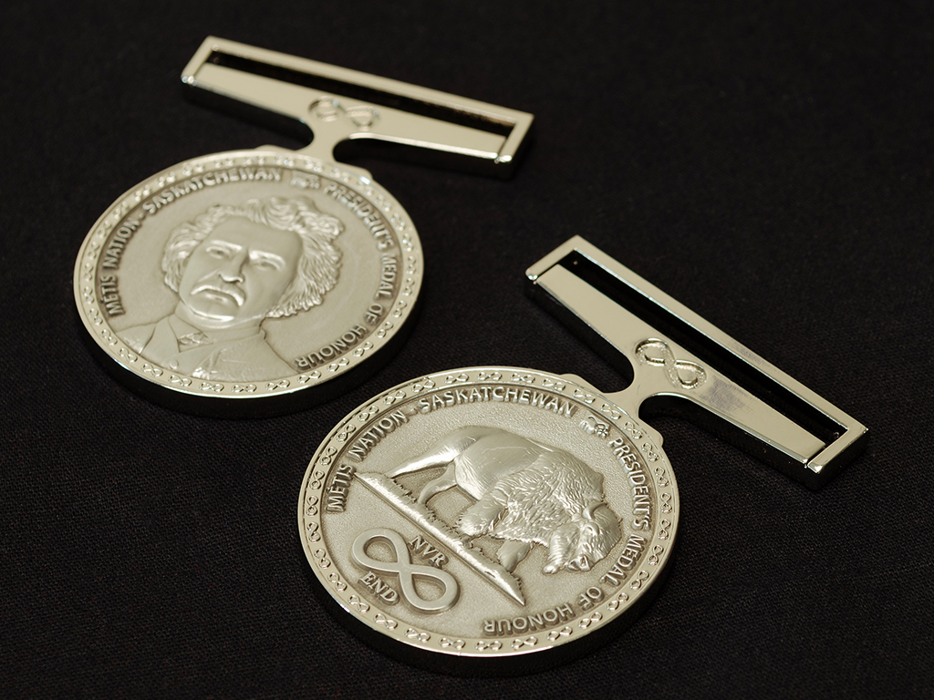 Pure nickel plated medals with 3D relief designs.