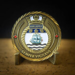 2D antique Bronze coin with Soft Enamel paints, an offset printed ship and Diamond-cut edge HMCS Vancouver challenge Coin Canada